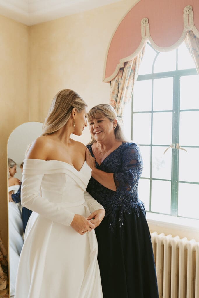 bride getting ready with mom