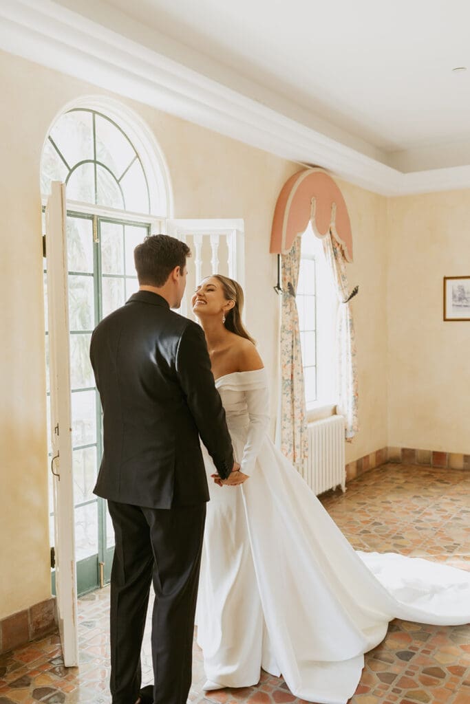 bride and groom first look as captured by a documentary style central florida wedding photographer
