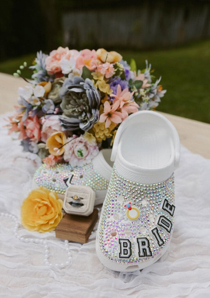 colorful pastel wedding detail photos with bride's crocs