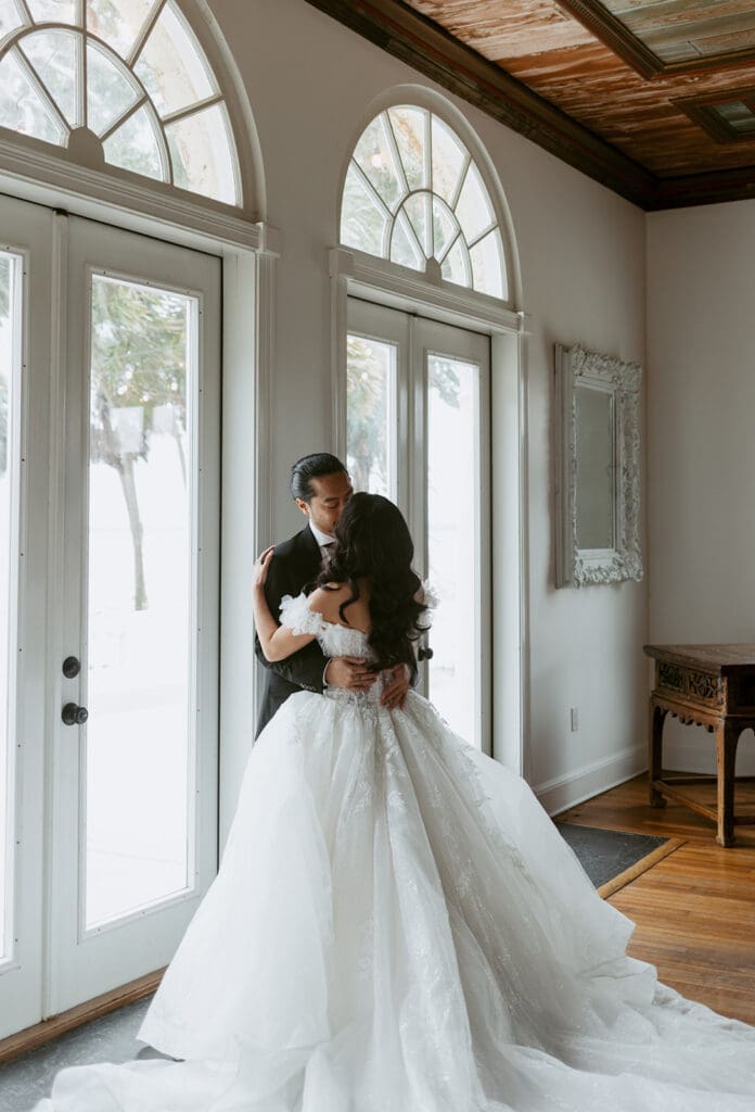 bride and groom at the ballroom in bella cosa