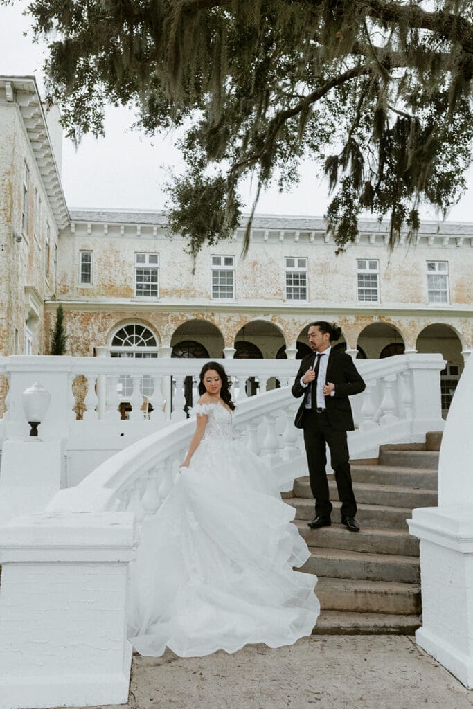 sweet couple in front of the bella cosa wedding venue in florida