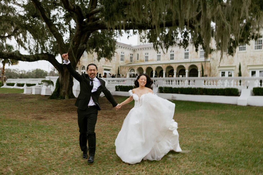 sweet couple in front of the bella cosa wedding venue in florida
