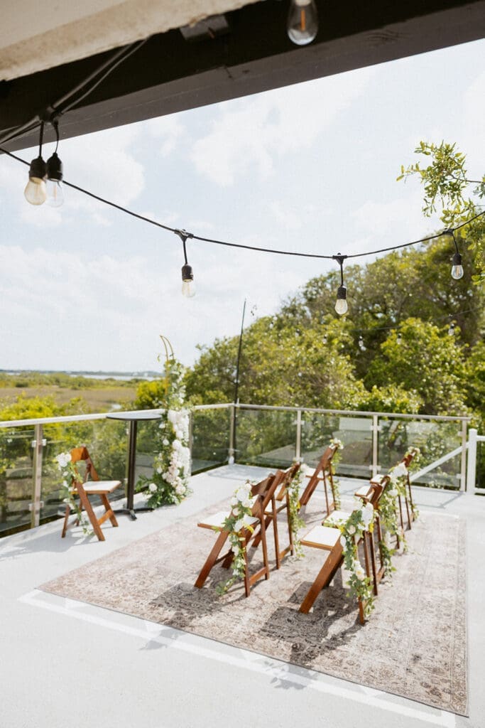 balcony elopement ceremony set up at a luxurious airbnb in st augustine fl