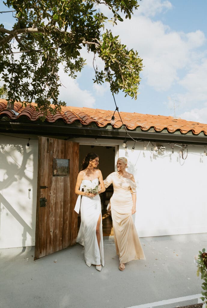mom walking bride down the aisle