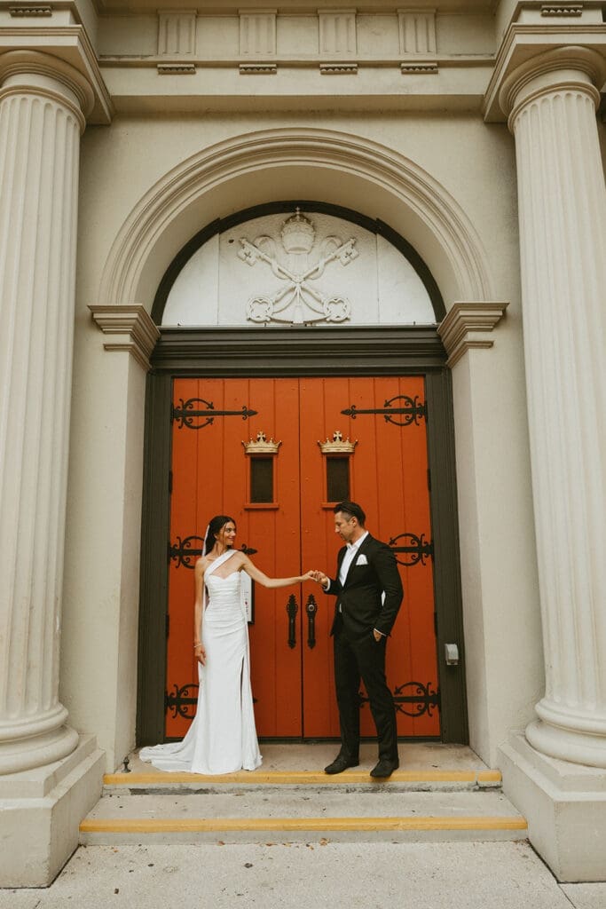 romantic st augustine elopement in front of european inspired architecture
