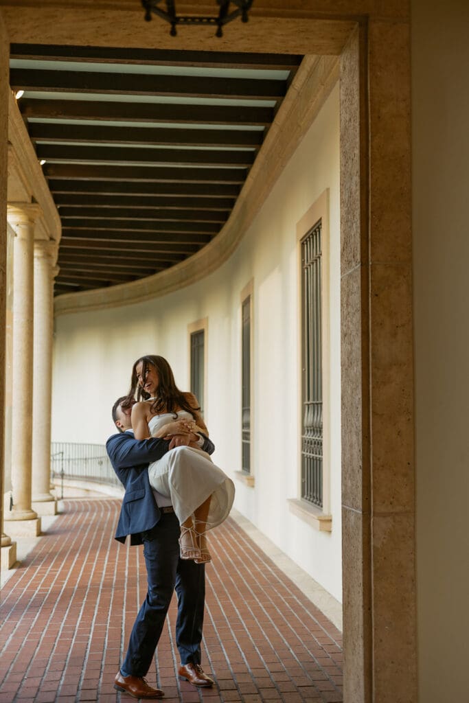 sweet couple at the art museum courtyard