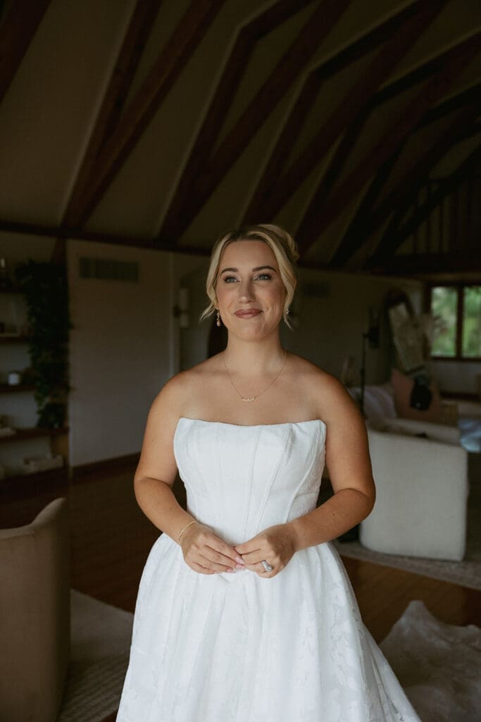 bridal portrait in front of a large window at uliana estate