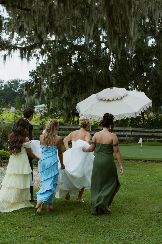 bride and bridesmaids walking 